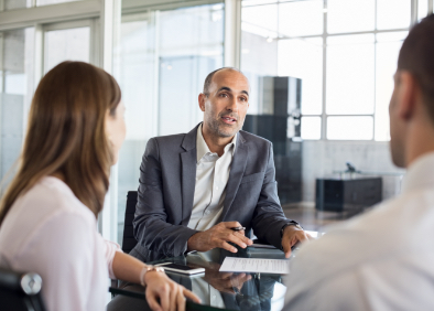 Flooring consultant reviewing project with clients